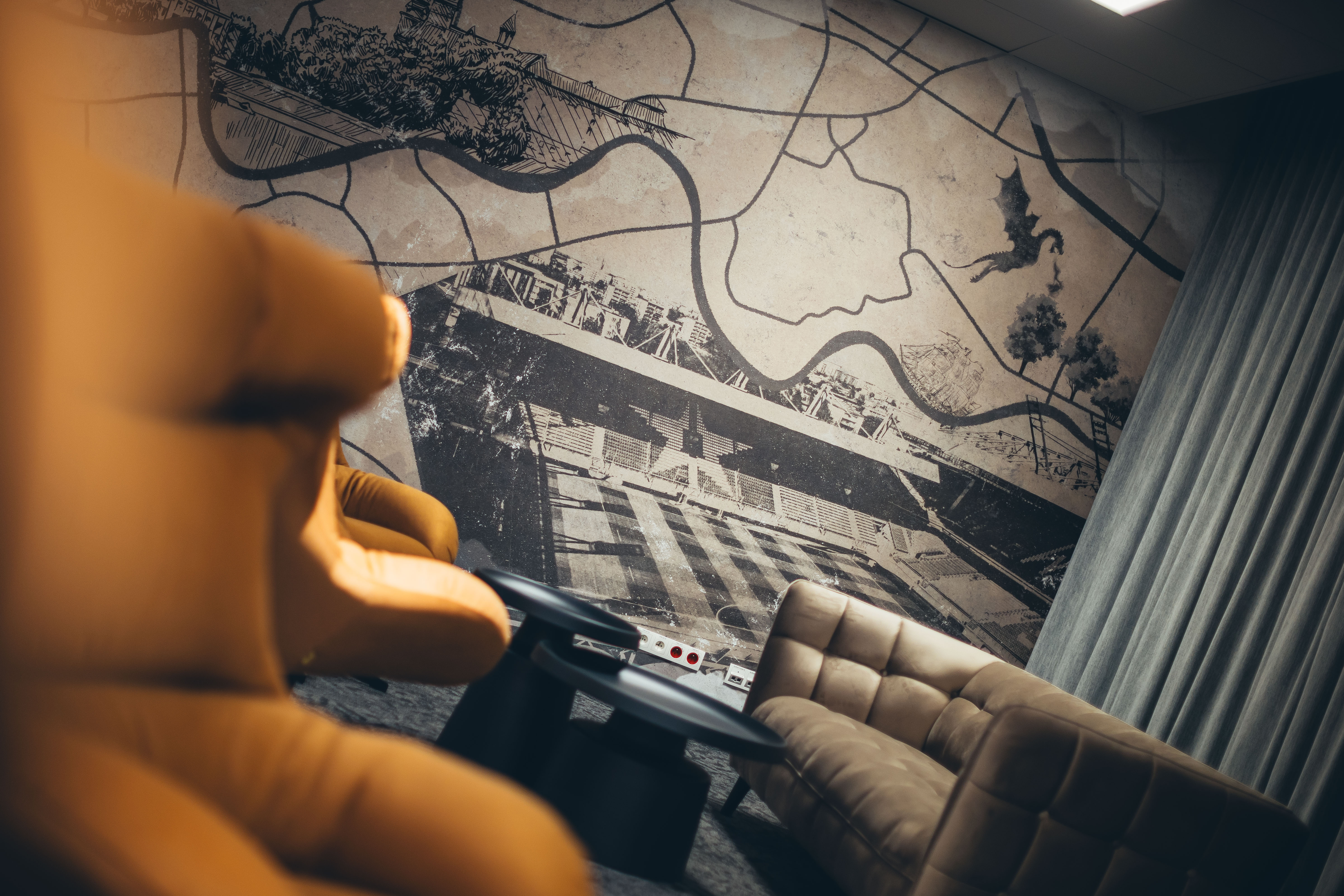 VIP Royal Lounge — close-up detail of the Vistula and dragon on the Kraków map mural