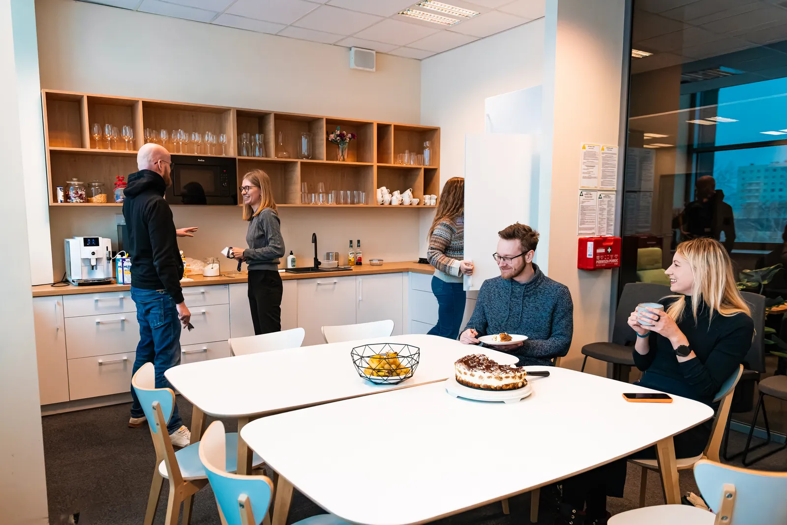 Kraków HQ — team in the kitchen lounge