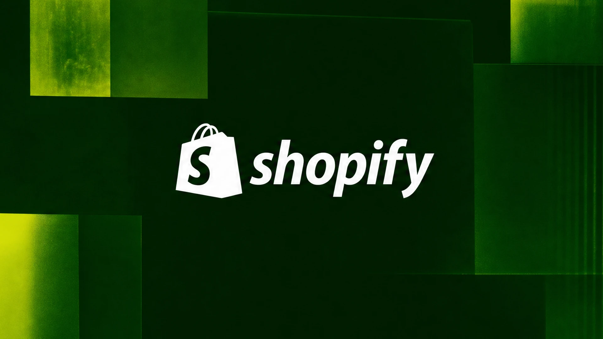 White Shopify logo on a dark green background with geometric green and yellow panels