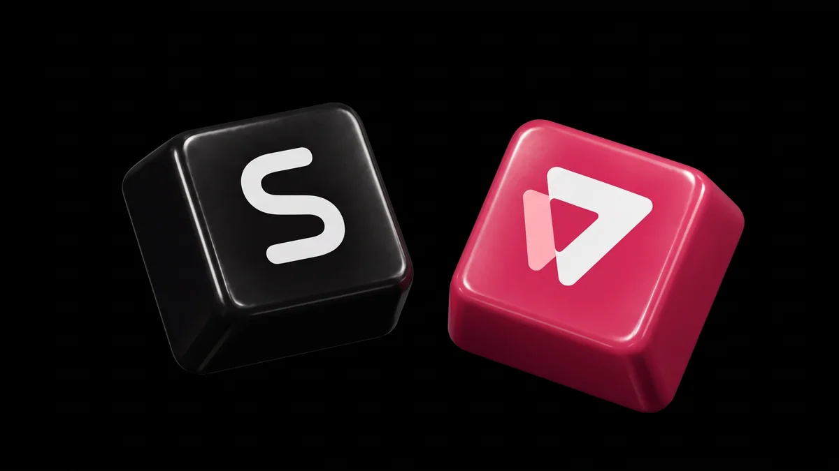 Synerise and VTEX logos on two keycaps — the Synerise S in black and the VTEX mark in red